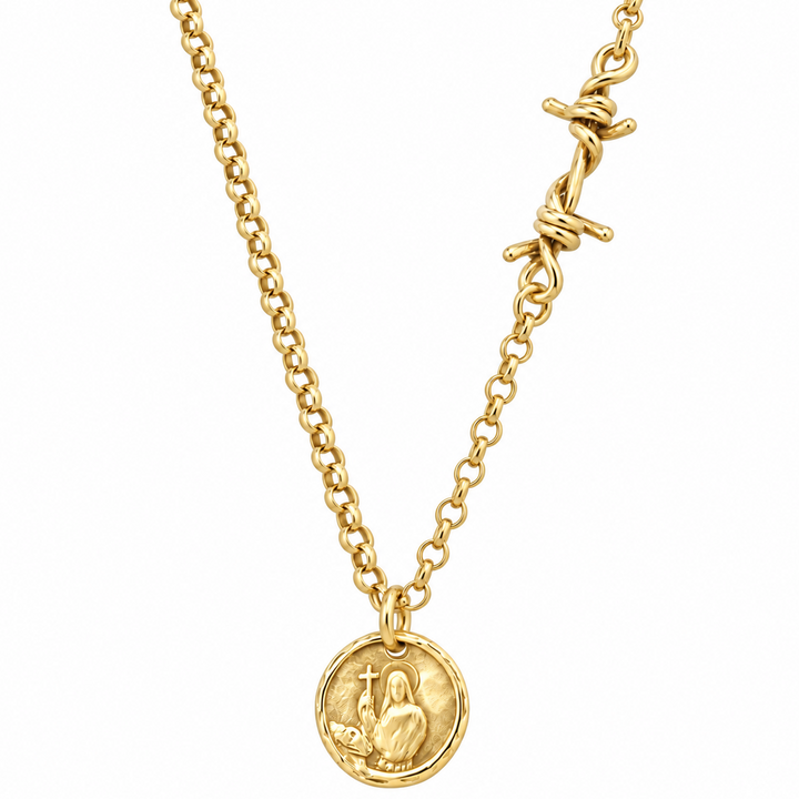 A gold chain necklace featuring a round gold coin pendant with an embossed figure and a barbed wire clasp closure, shown against a plain white background.