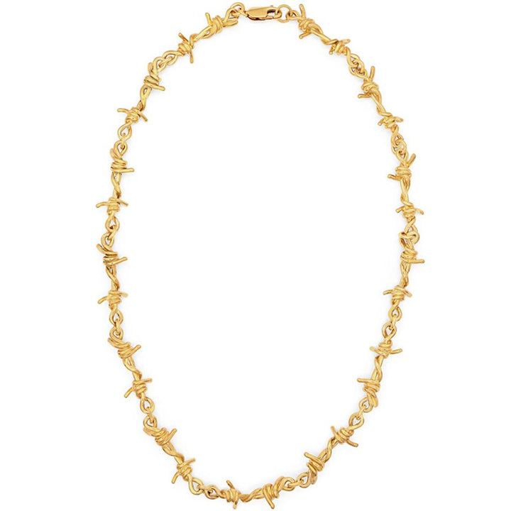 A gold barbed wire style necklace with a clasp, displayed against a white background.