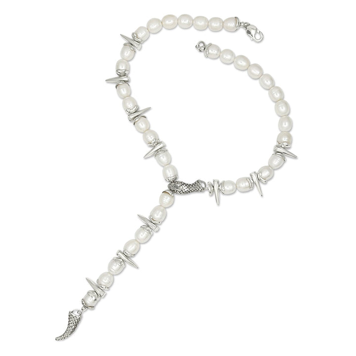 Pearl necklace with silver accents on a white background