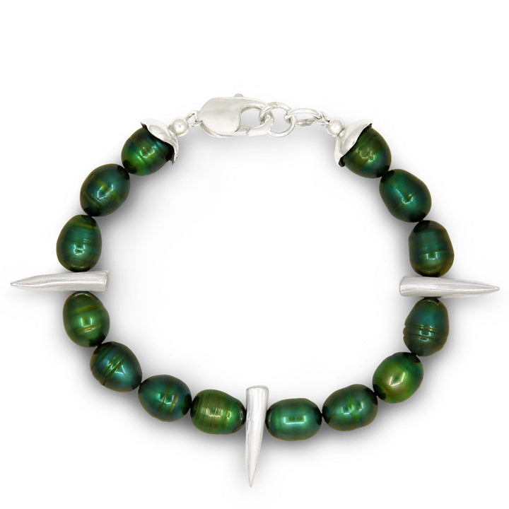 Green beaded bracelet with silver accents on a white background