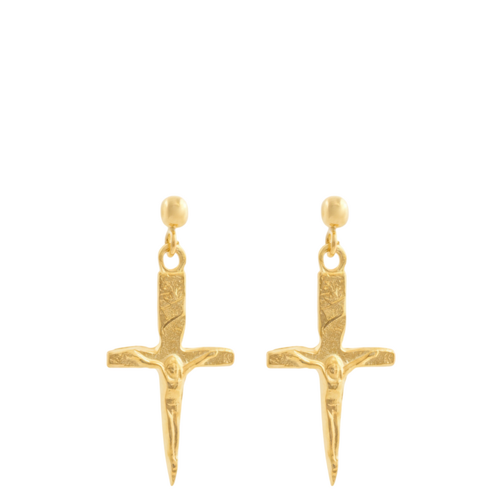 Gold cross-shaped earrings on a white background