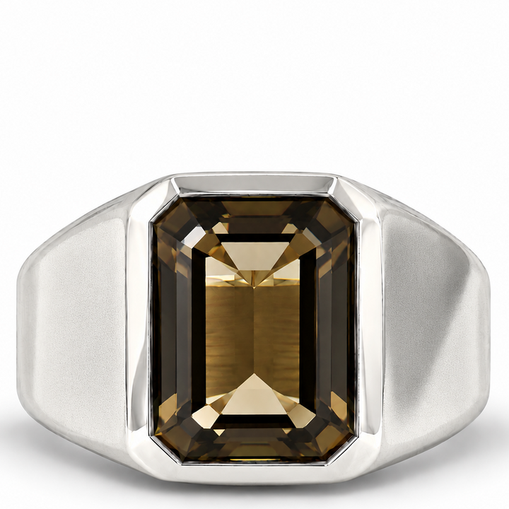 A silver signet ring featuring a large, faceted rectangular smoky brown gemstone, shown on a clean white background.