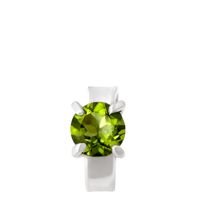 Silver ring with a green gemstone on a white background