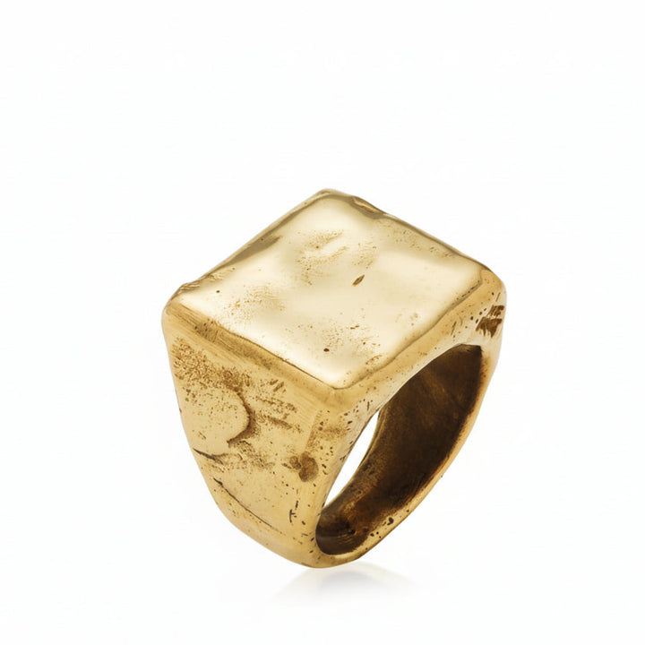 Handmade 14k Gold square signet ring with a melted texture surface.