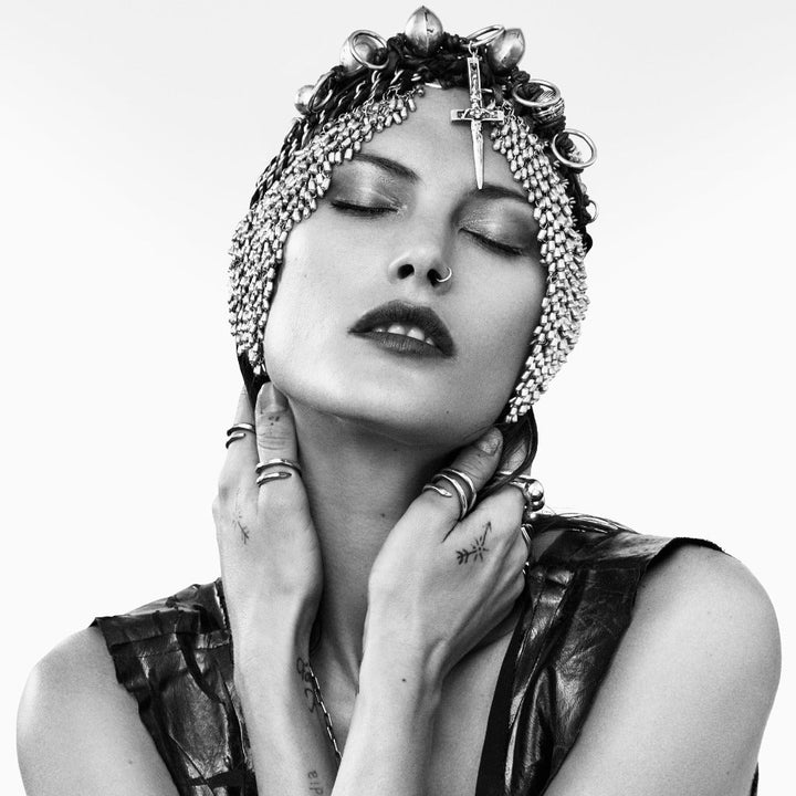 female model wearing our crucifix dagger headdress