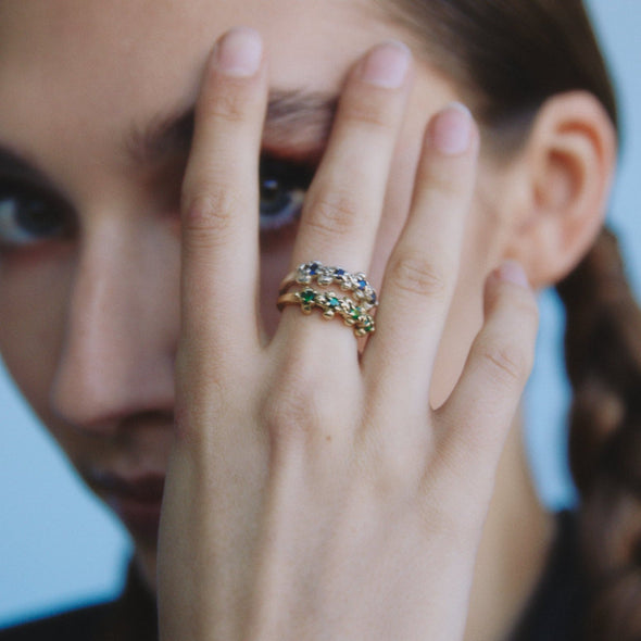 model wearing our 14k studded sapphire ring