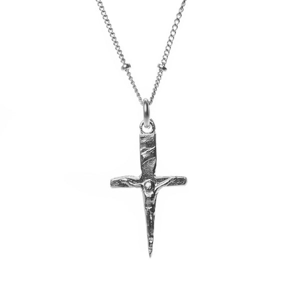 sterling silver mini crucifix dagger pendant hanging from sterling silver beaded chain