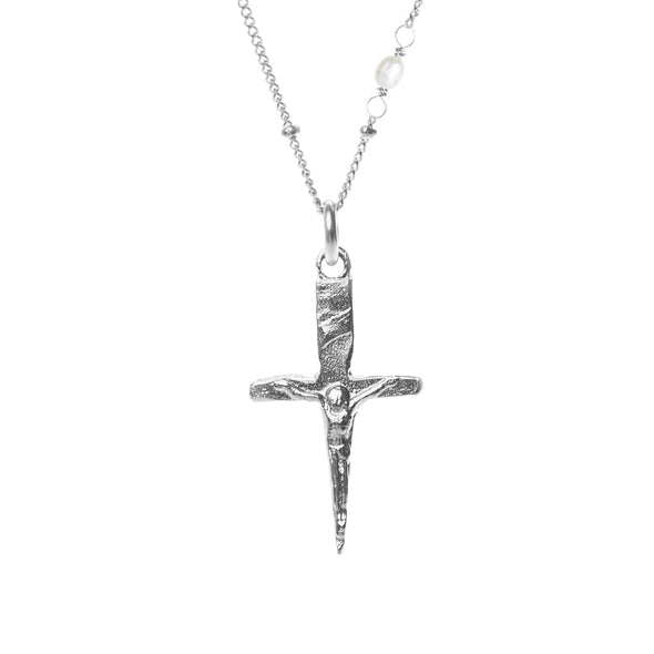 sterling silver mini crucifix dagger pendant hanging from sterling silver beaded chain with pearl