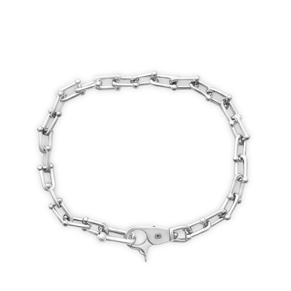 Silver chain bracelet on a white background
