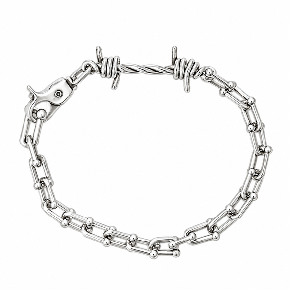 A silver-toned chain bracelet featuring alternating polished ball links and twisted barbed wire links, with a fish-shaped clasp, shown on a plain white background.