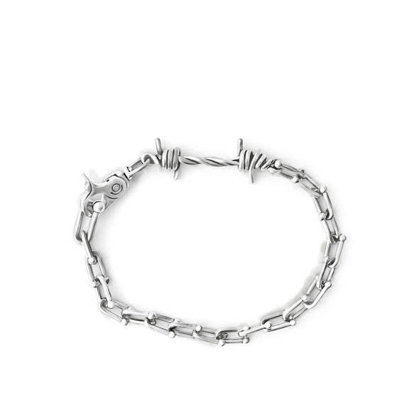Silver chain bracelet on a white background