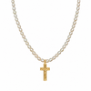 A gold crucifix pendant necklace with a strand of small, lustrous white pearls, shown against a plain white background.