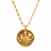 A gold chain necklace featuring a round, textured gold pendant with an embossed figure, shown against a plain white background.