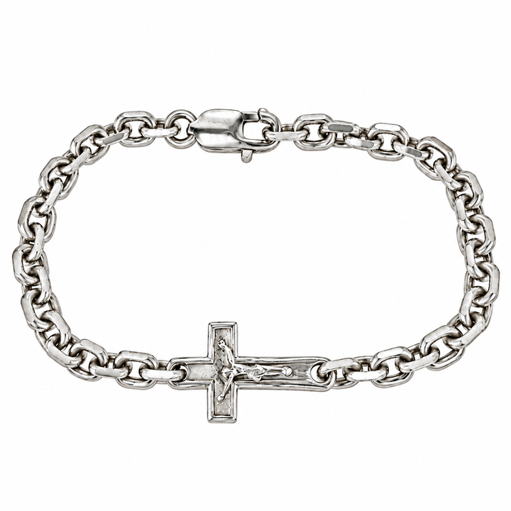 A silver-toned chain bracelet featuring a detailed crucifix pendant with a raised figure of Jesus, displayed on a clean white background.