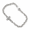 A silver-toned chain bracelet with a crucifix pendant, displayed on a clean white background.