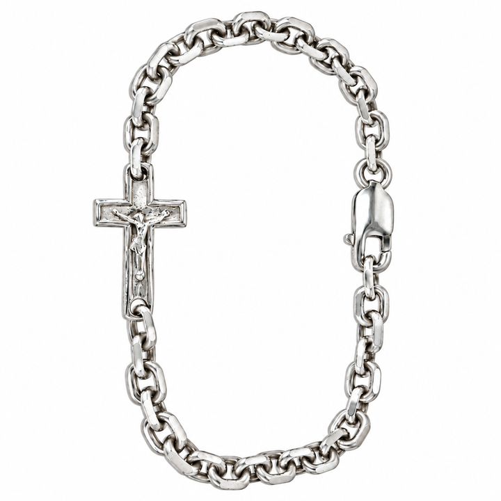 A silver-toned chain bracelet featuring a crucifix pendant with a detailed figure of Jesus and a spring-ring clasp, shown on a plain white background.