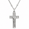 Silver crucifix pendant necklace with a detailed corpus on a polished cross, suspended from a matching chain on a white background.