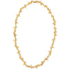 A gold barbed wire style necklace with a clasp, displayed against a white background.