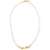 A white pearl necklace with a gold barbed wire link chain.