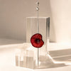 A sterling silver cocktail pick with barbed wire detail, handmade by Britt Bolton