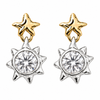 A pair of gold and silver dangle earrings, each featuring a polished gold star stud connected to a silver sunburst pendant with a clear round-cut center stone, shown on a plain white background.