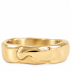 A wide, organic-shaped gold ring with a polished, fluid, wavy surface texture, shown on a clean white background.
