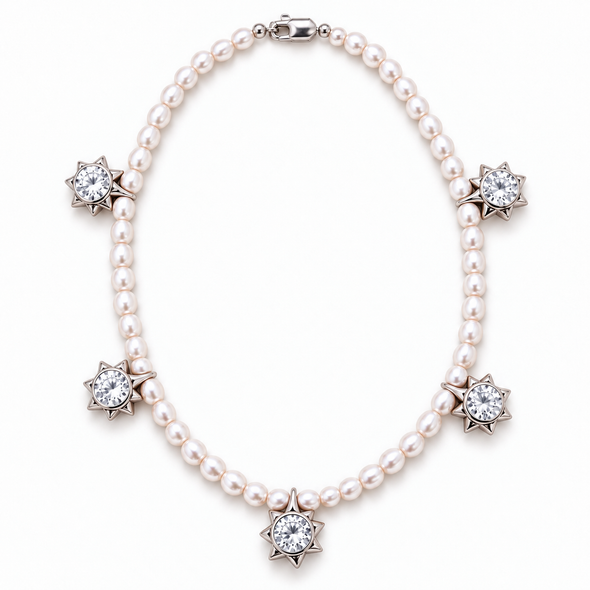 A pearl necklace with five star-shaped settings, each holding a clear round gemstone, displayed on a clean white background.