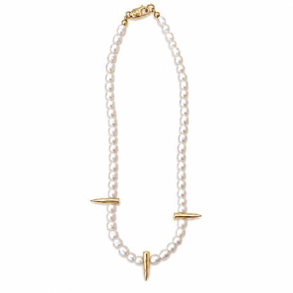 A double-strand pearl necklace with gold-toned spike and bar accents, displayed on a clean white background.