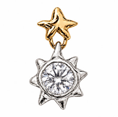 A two-tone celestial pendant featuring a polished gold five-pointed star at the top and a silver-toned eight-pointed sunburst design below, centered around a round clear gemstone, set against a plain white background.