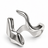 A polished silver abstract ring with a fluid, wavy, organic design, shown on a clean white background.