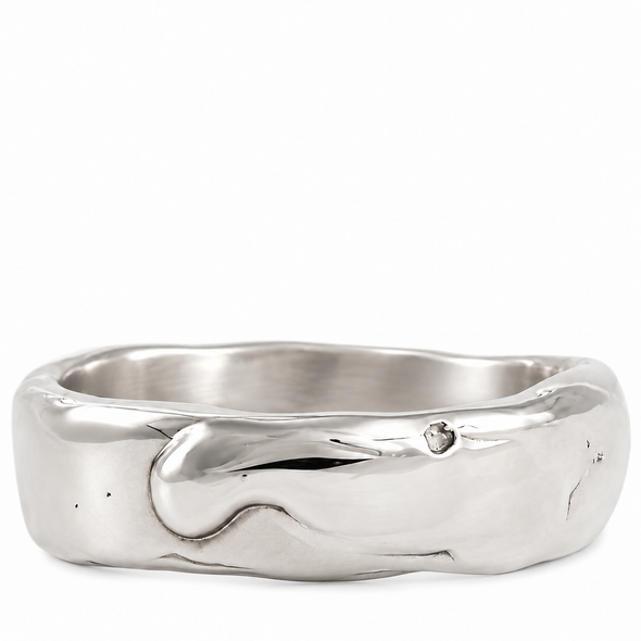 A wide, polished silver ring with an organic, wavy, fluid texture, photographed on a clean white background.