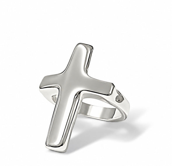 A polished silver cross ring with a smooth, reflective finish, shown on a clean white background with a soft shadow.