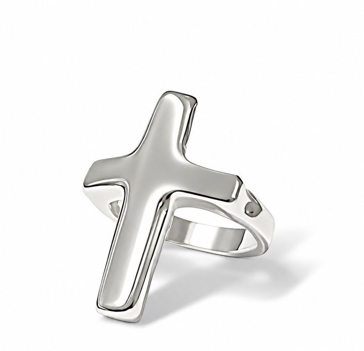 A polished silver cross ring with a smooth, reflective finish, shown on a clean white background with a soft shadow.