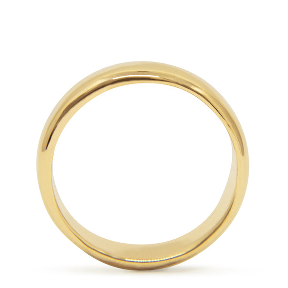 GOLD WEDDING BAND ON WHITE BACK GROUND
