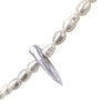 Pearl necklace with a silver spike pendant on a white background