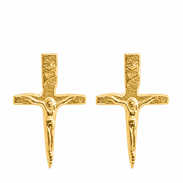 A pair of gold crucifix stud earrings with a textured, embossed design, shown on a plain white background.