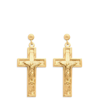 Gold cross earrings on a white background