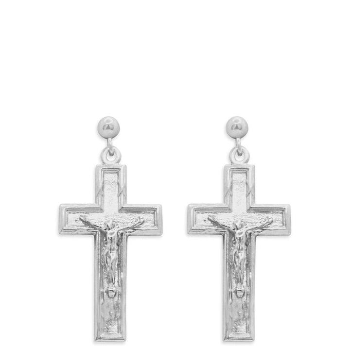 Pair of silver cross earrings on a white background