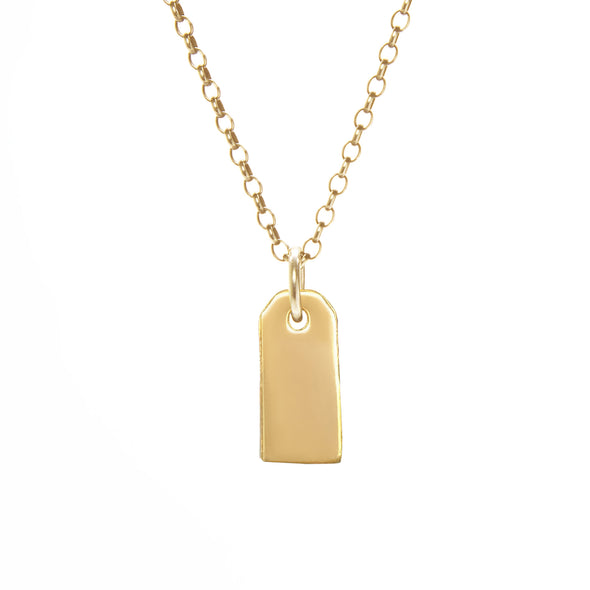 Gold necklace with a tag pendant on a white background