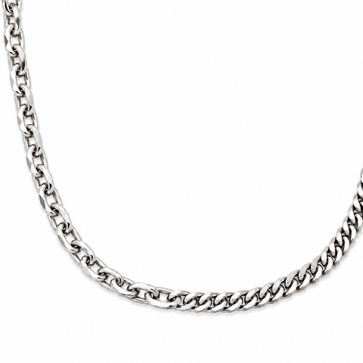 A close-up of a polished silver-tone curb chain necklace on a plain white background.