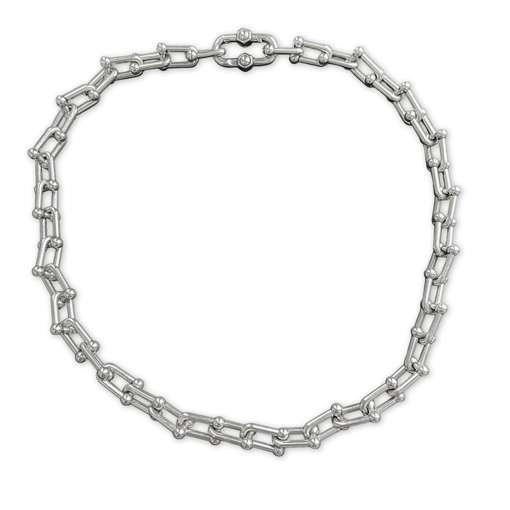 Silver chain necklace on a white background