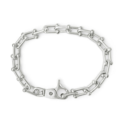 Silver chain bracelet on a white background