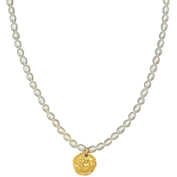 Pearl necklace with a gold pendant on a white background