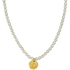 Pearl necklace with a gold pendant on a white background
