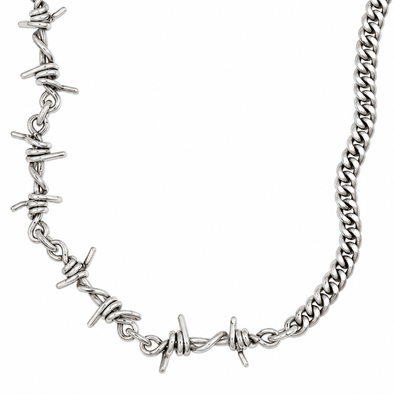 A silver-toned metal chain necklace featuring multiple barbed wire motifs along the front, shown against a plain white background.