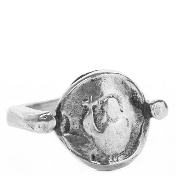 Silver ring with a heart design on a white background