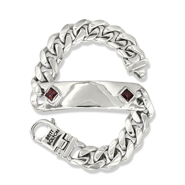 Silver chain-style bracelet with embedded gemstones on a white background