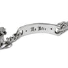 Silver chain bracelet with engraved text on a white background