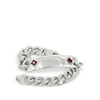 Silver chain bracelet with red stones on a white background