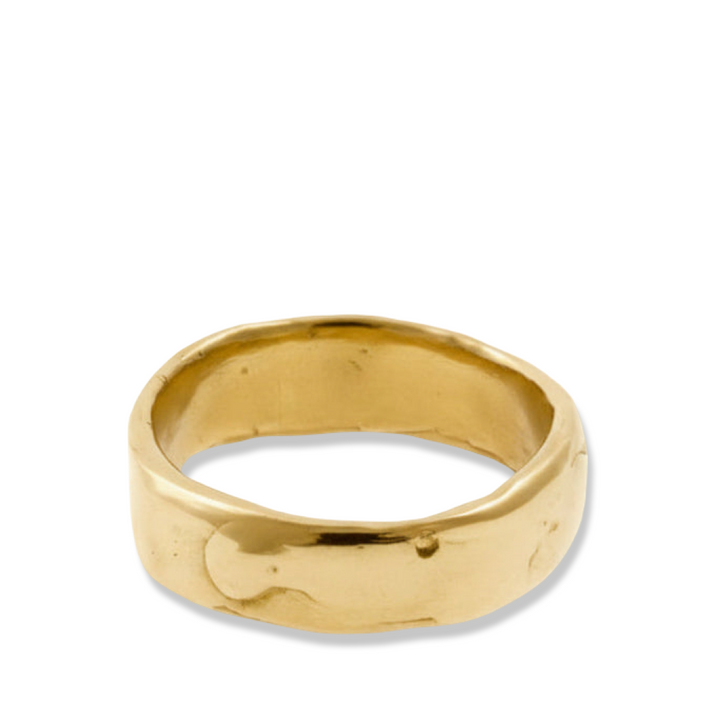 Gold ring on a white background